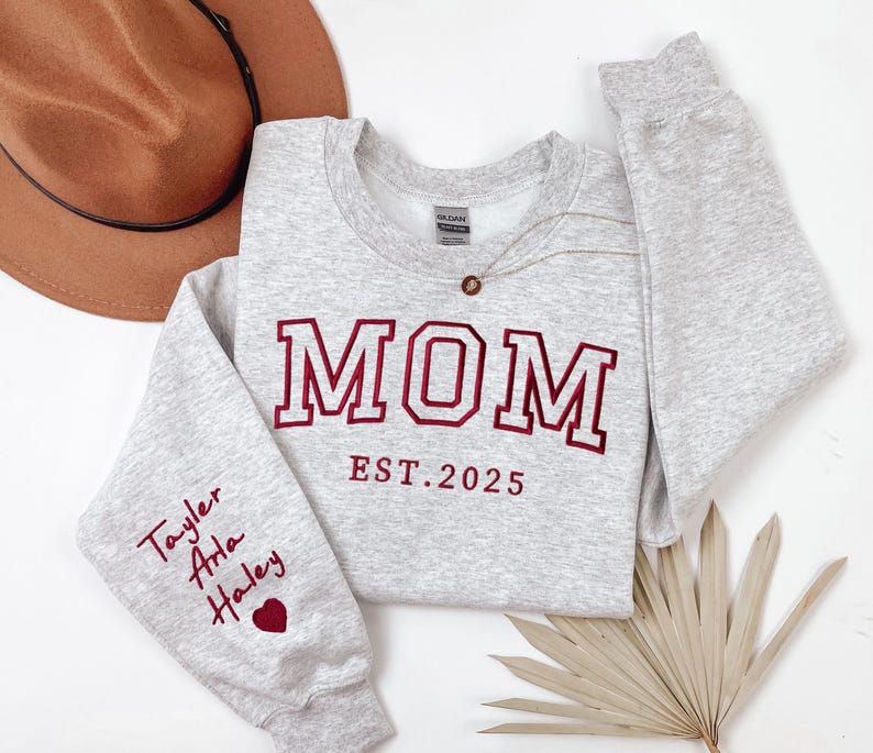 Custom Embroidered Sweatshirt With Your Child's Name And Heart On The Sleeve As A Mother’s/Father's Day Gift