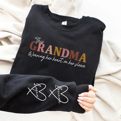 🔥For Mom🔥Personalized MAMA Wears Her Heart On Her Sleeve Sweatshirt(Buy 2 Free Shipping)