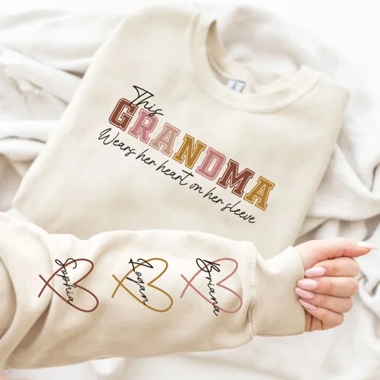 🔥For Mom🔥Personalized MAMA Wears Her Heart On Her Sleeve Sweatshirt(Buy 2 Free Shipping)