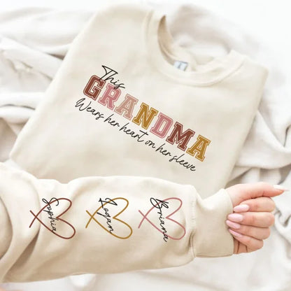 🔥For Mom🔥Personalized MAMA Wears Her Heart On Her Sleeve Sweatshirt(Buy 2 Free Shipping)
